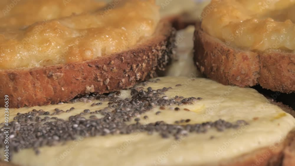 The toasted bread with the butter toppings .close-up.4K UHD The toasted bread with the butter toppings .close-up.4K UHD