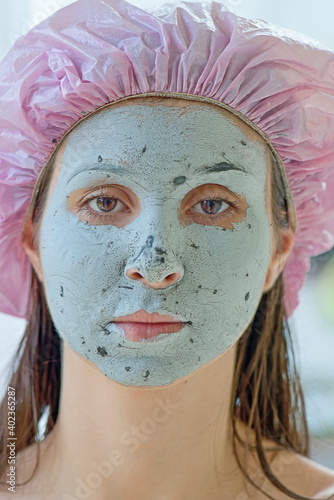 Fototapeta Naklejka Na Ścianę i Meble -  Girl with facial mask for skin treatment. Brasilia, Brasil