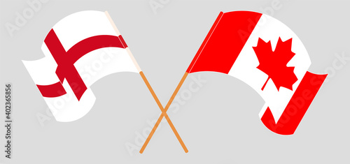 Crossed and waving flags of England and Canada