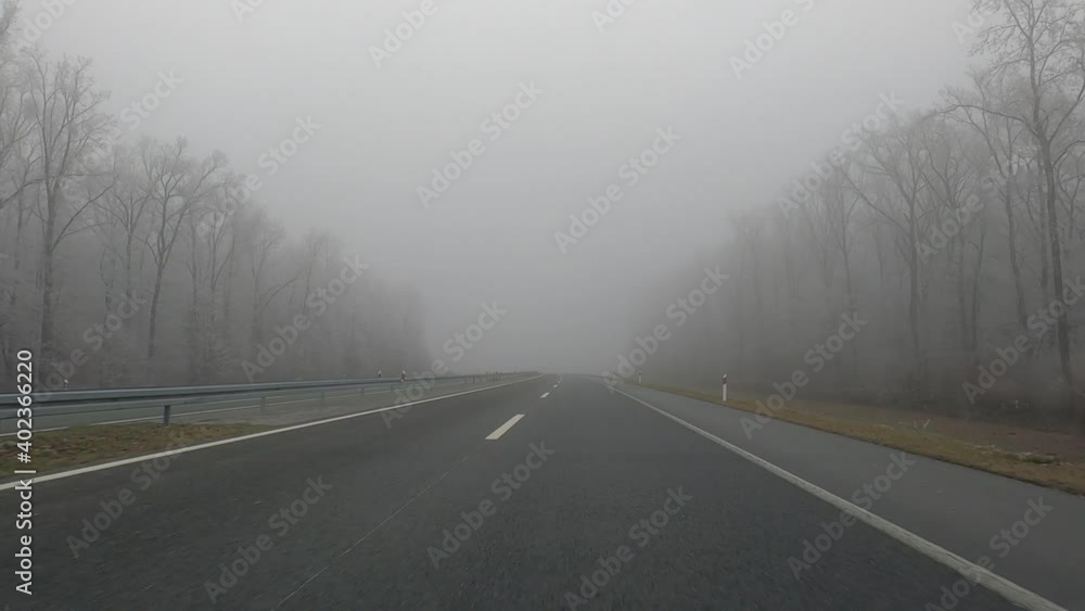 Driving on the road and shooting in the early winter morning with the sun and fog of the fields and the surrounding nature covered with cold frost. Driving on the road and shooting in the early winter morning with the sun and fog of the fields and the surrounding nature covered with cold frost.