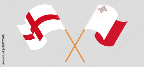 Crossed and waving flags of England and Malta