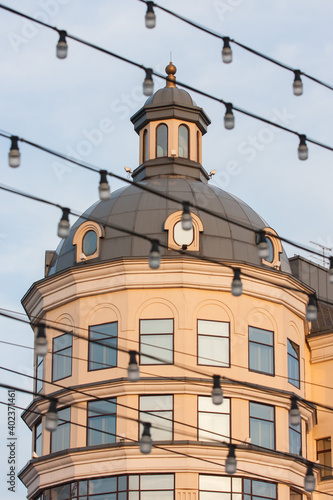 Building with a round tower in Moscow at sunset. Russia