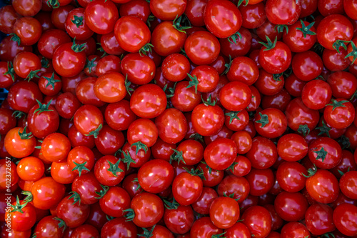 background from red ripe tomatoes grown without chemistry