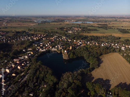 Aerial view of heart shaped lake Kirchbruch See with mountain chapel church Bergkirche Beucha in Brandis Leipzig Saxony photo