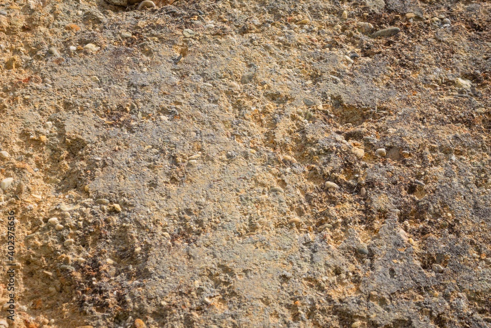 Natural yellow stone background with texture Natural yellow stone background with texture