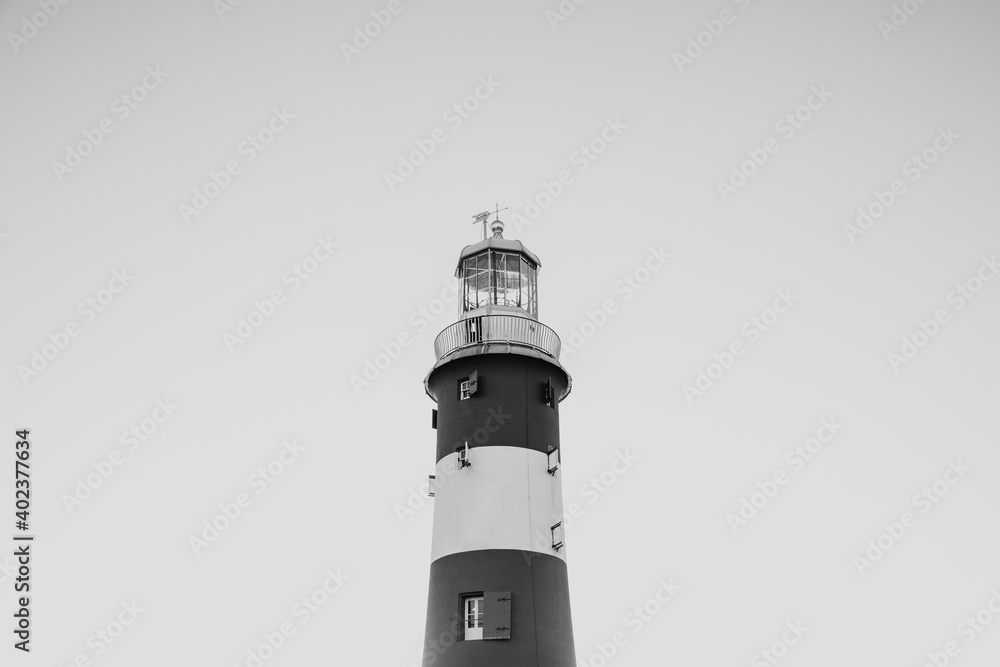 isolated lighthouse in black and white