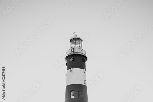 isolated lighthouse in black and white