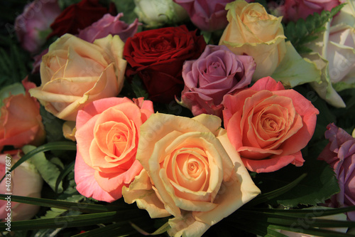 Pastel roses in bridal arrangement