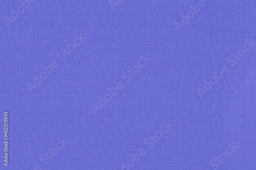 Clean purple retro paper background. Vintage violet cardboard texture. Grunge paper for drawing. Simple blank fabric pattern.