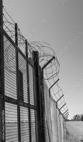 Razor wire fence at a military establishment in England