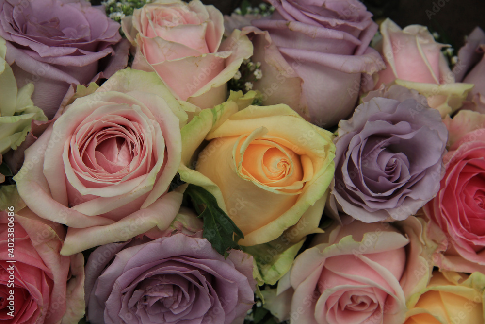 Pastel roses in bridal arrangement Pastel roses in bridal arrangement