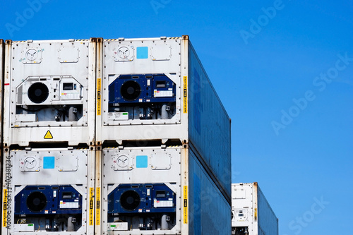 Stacked containers in a shipping terminal