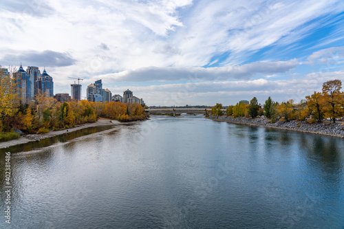 Prince's Island Park autumn foliage scenery. Bow river bank, downtown Calgary, Alberta, Canada.