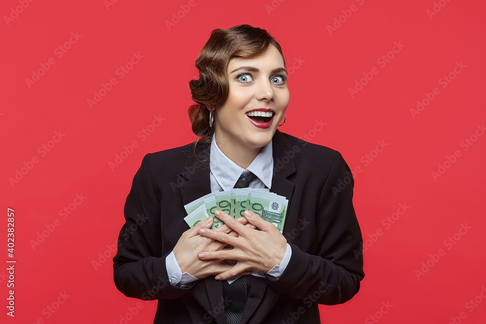 attractive girl in retro style holds euro banknotes in her hands attractive girl in retro style holds euro banknotes in her hands