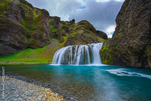 Waterfall in the mountains - Iceland