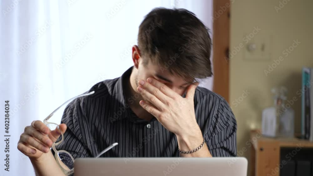 Stressed business man teacher looking at computer laptop screen. Stressed business man teacher looking at computer laptop screen.