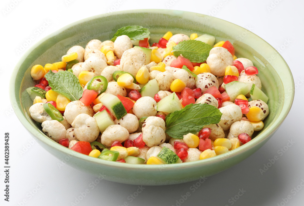 makhana salad or foxnuts salad with pommegranate, sweet corn, tomato, cucumber and chopped green chillies. Makhana is a healthy snack with high nutritional value mostly popular in North India
makhana salad or foxnuts salad with pommegranate, sweet corn, tomato, cucumber and chopped green chillies. Makhana is a healthy snack with high nutritional value mostly popular in North India