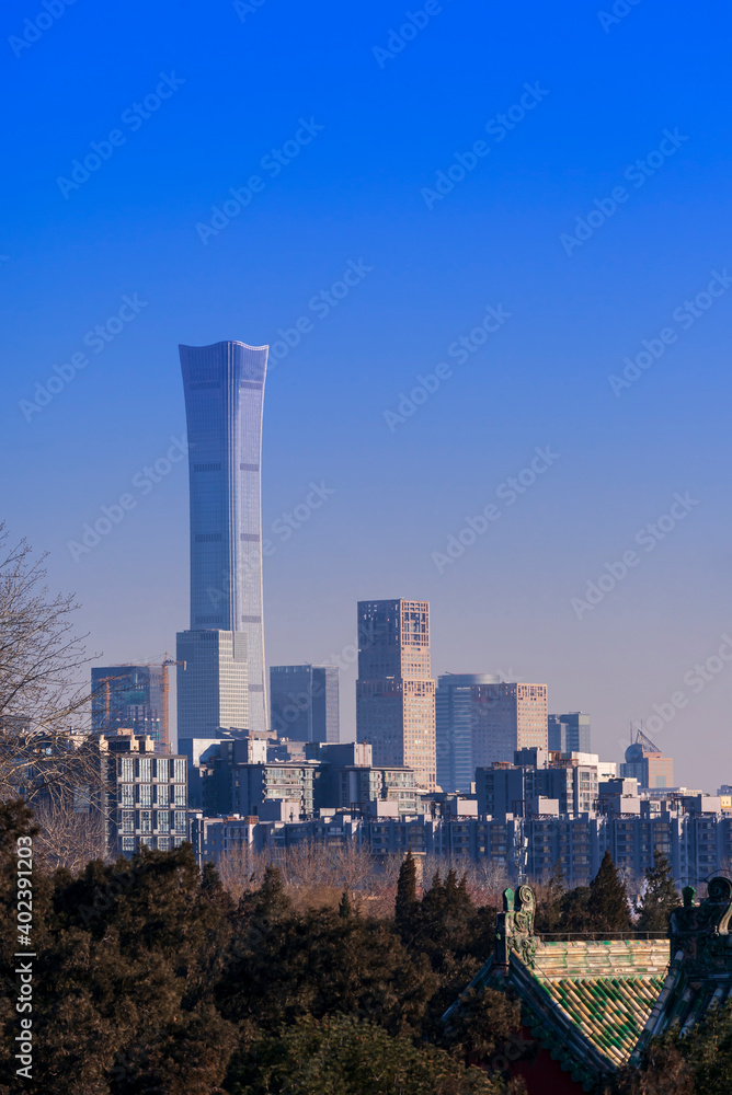 Beijing cityscape between ancient chinese architecture. historic buildings and  Beijing modern building with sweet sun rise sky, Beijing, China