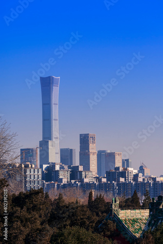 Beijing cityscape between ancient chinese architecture. historic buildings and Beijing modern building with sweet sun rise sky, Beijing, China