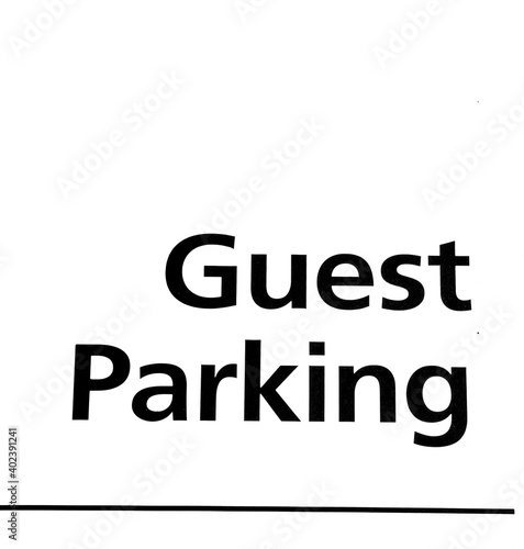 Guest parking sign outdoors.