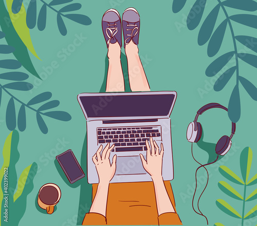 Young woman working on  computer in the garden. Nature landscape background. Summer holidays illustration. Vacation time