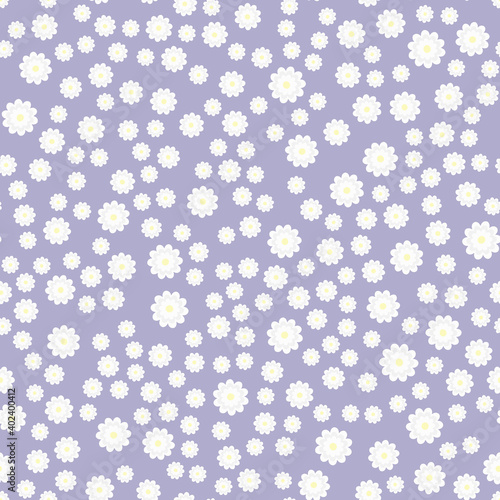 Floral seamless pattern. Chamomile or daisies. Endless cute ornament for textile or design. Chamomiles on a lilac background. Fashionable print. Vector image. Flat style.
