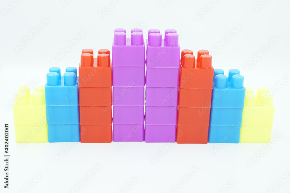 Colored stacking blocks on a white background Colored stacking blocks on a white background