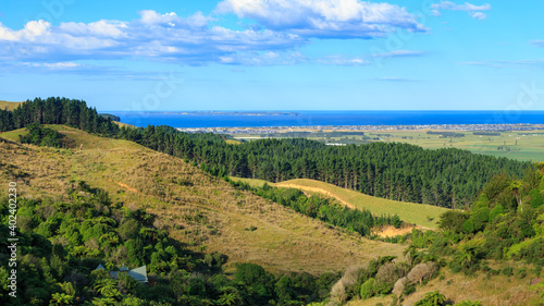 Panoramic view from the Papamoa Hills in the Bay of Plenty, New Zealand, looking towards the ocean. The coastal suburb of Papamoa can be seen in the distance