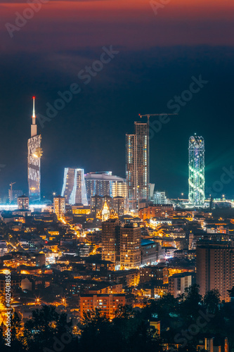 Batumi  Adjara  Georgia. Aerial View Of Urban Cityscape At Sunset. Town At Evening Blue Hour time. City In Night Lights Illuminations