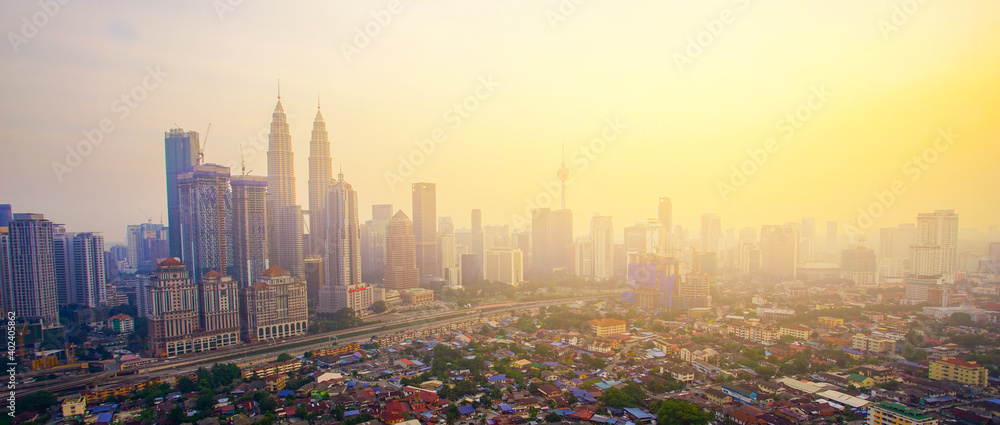 Fototapeta premium Aerial panoramic view of Kuala Lumpur city during sunrise.