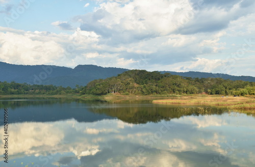 landscape of water reservoir lake with mountain background