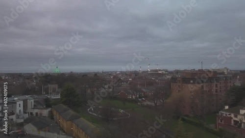 Trucking shot from the air moving to the left on Chrismas morning in Dublin, an area of the city called Ranelagh. This is a residential area of the city. (early in the morning) photo