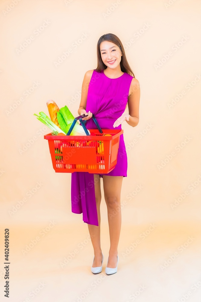 Portrait beautiful young asian woman with grocert basket from supermarket Portrait beautiful young asian woman with grocert basket from supermarket