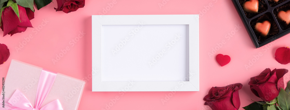 Valentine's Day memory with picture frame concept on pink background