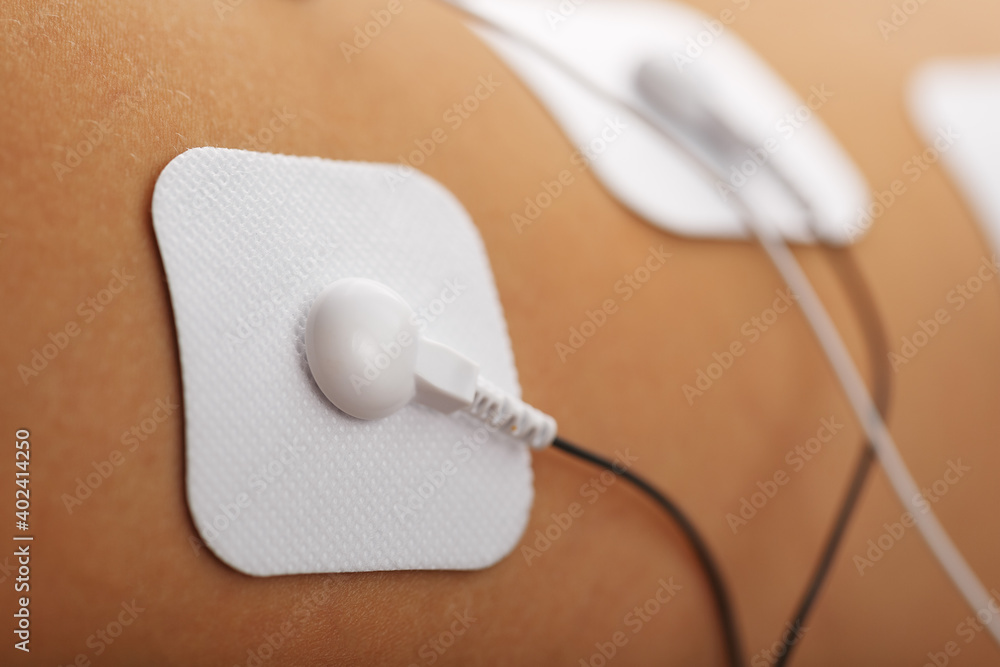 Muscle stimulator with electrodes, the massager on the buttocks and legs. Muscle stimulator with electrodes, the massager on the buttocks and legs.