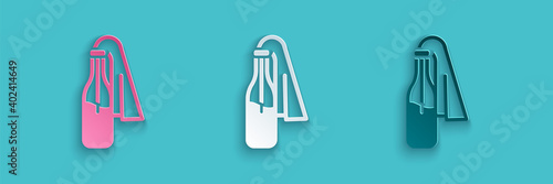 Paper cut Cocktail molotov icon isolated on blue background. Paper art style. Vector.