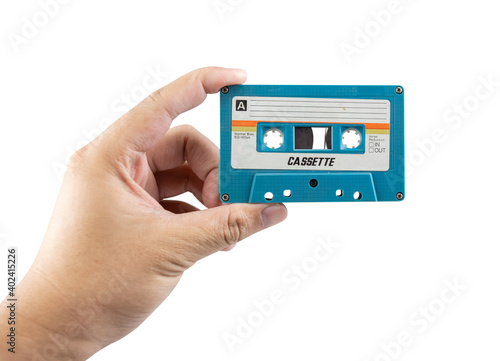 hand with audio cassette isolated