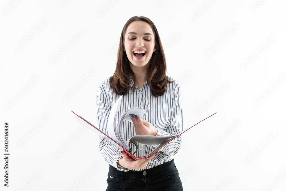 Young woman reads documents in a red folder Young woman reads documents in a red folder