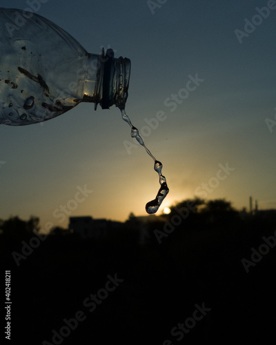 silhouette of a bottle of water photo