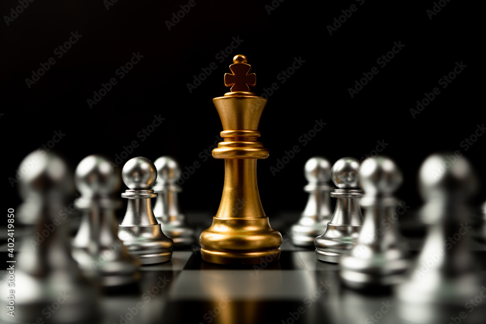 Golden Chess King standing to Be around of other chess, Concept of a leader must have courage and challenge in the competition, leadership and business vision for a win in business games Golden Chess King standing to Be around of other chess, Concept of a leader must have courage and challenge in the competition, leadership and business vision for a win in business games