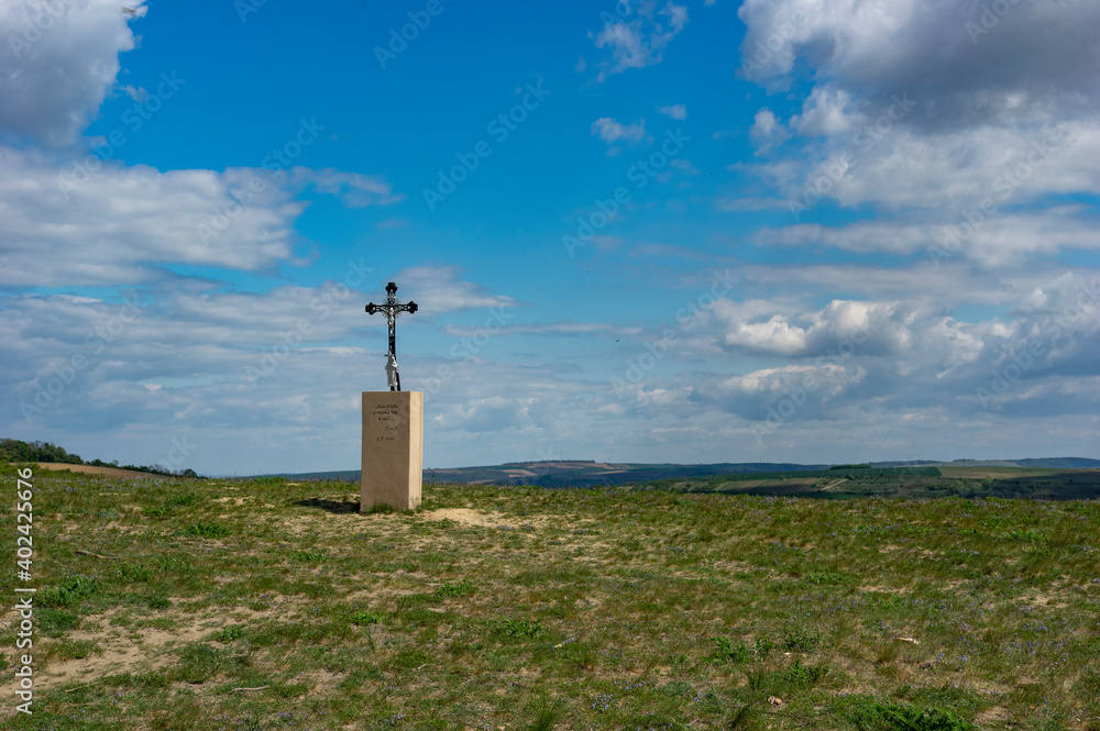 Pouzdrany step with a cross including a Bible quote: 