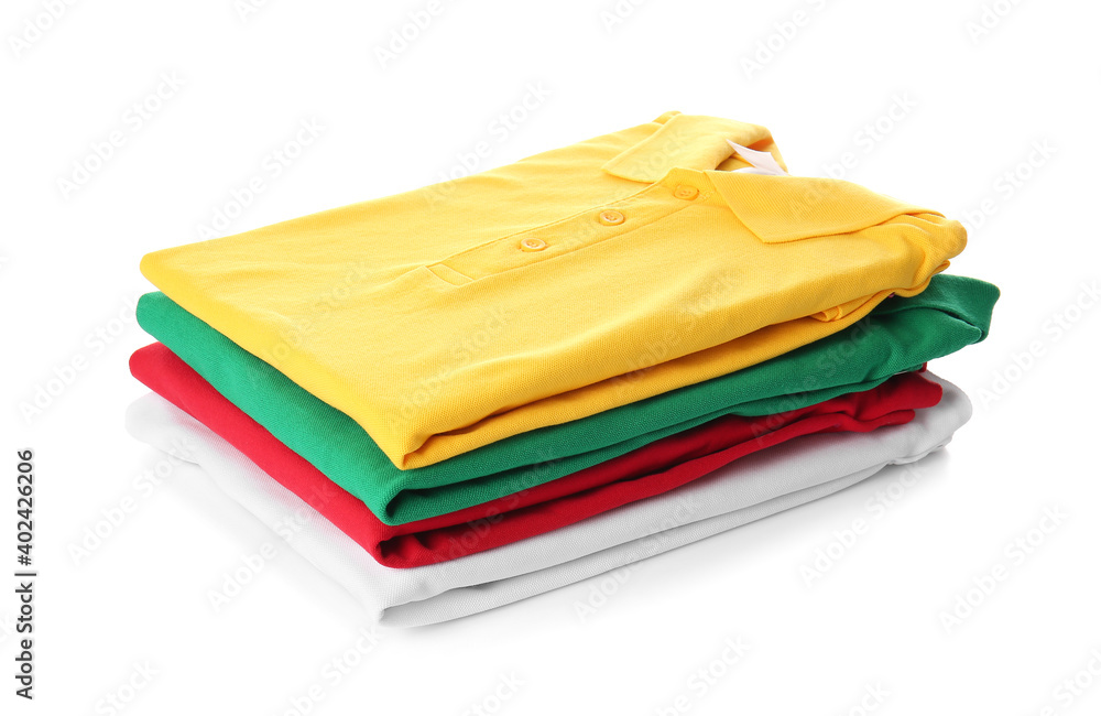 Stack of folded polo shirts on white background Stack of folded polo shirts on white background