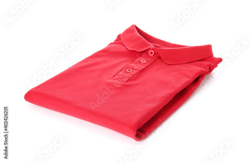 Folded polo shirt on white background