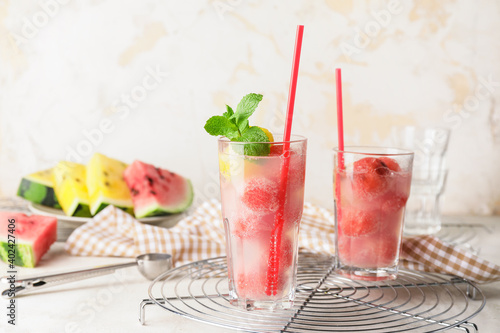 Glasses of tasty watermelon cocktail on table