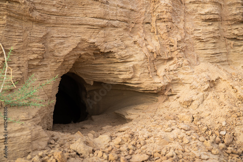 Cave, hole or burrow in the sand ground