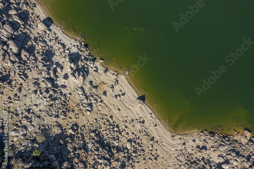 Aerial Zenith views of forest, fields and old wooden bridge
