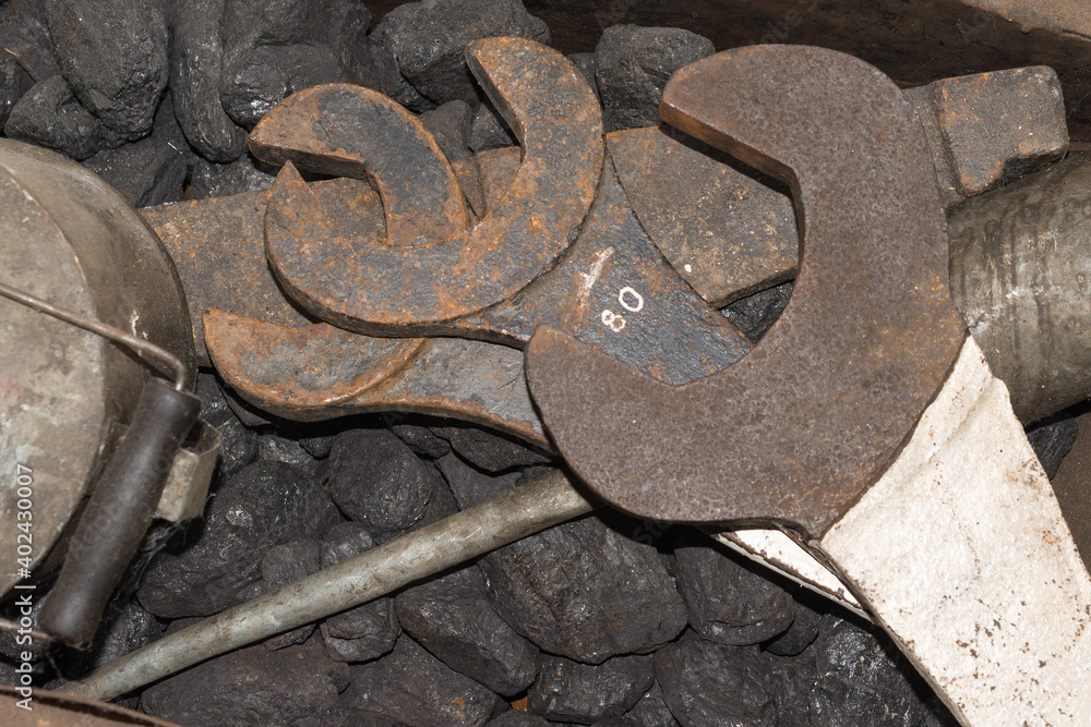 Antique large rusty wrenches. Old locomotive train toolset with heavy-duty spanners used in railway maintenance Antique large rusty wrenches. Old locomotive train toolset with heavy-duty spanners used in railway maintenance