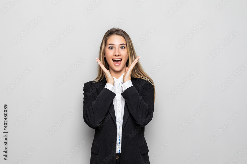Portrait of happy young business woman surprised isolated on white background. Portrait of happy young business woman surprised isolated on white background.