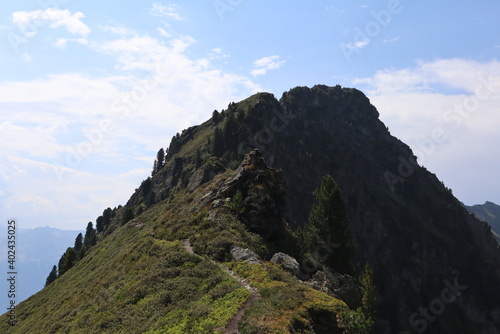 Breathtaking green mountain ridge in lonely austrian alps