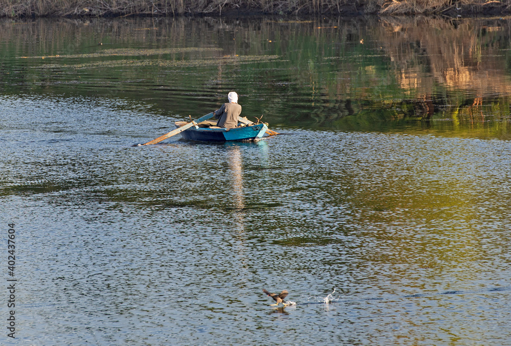 Traditional egyptian bedouin fisherman on river Traditional egyptian bedouin fisherman on river